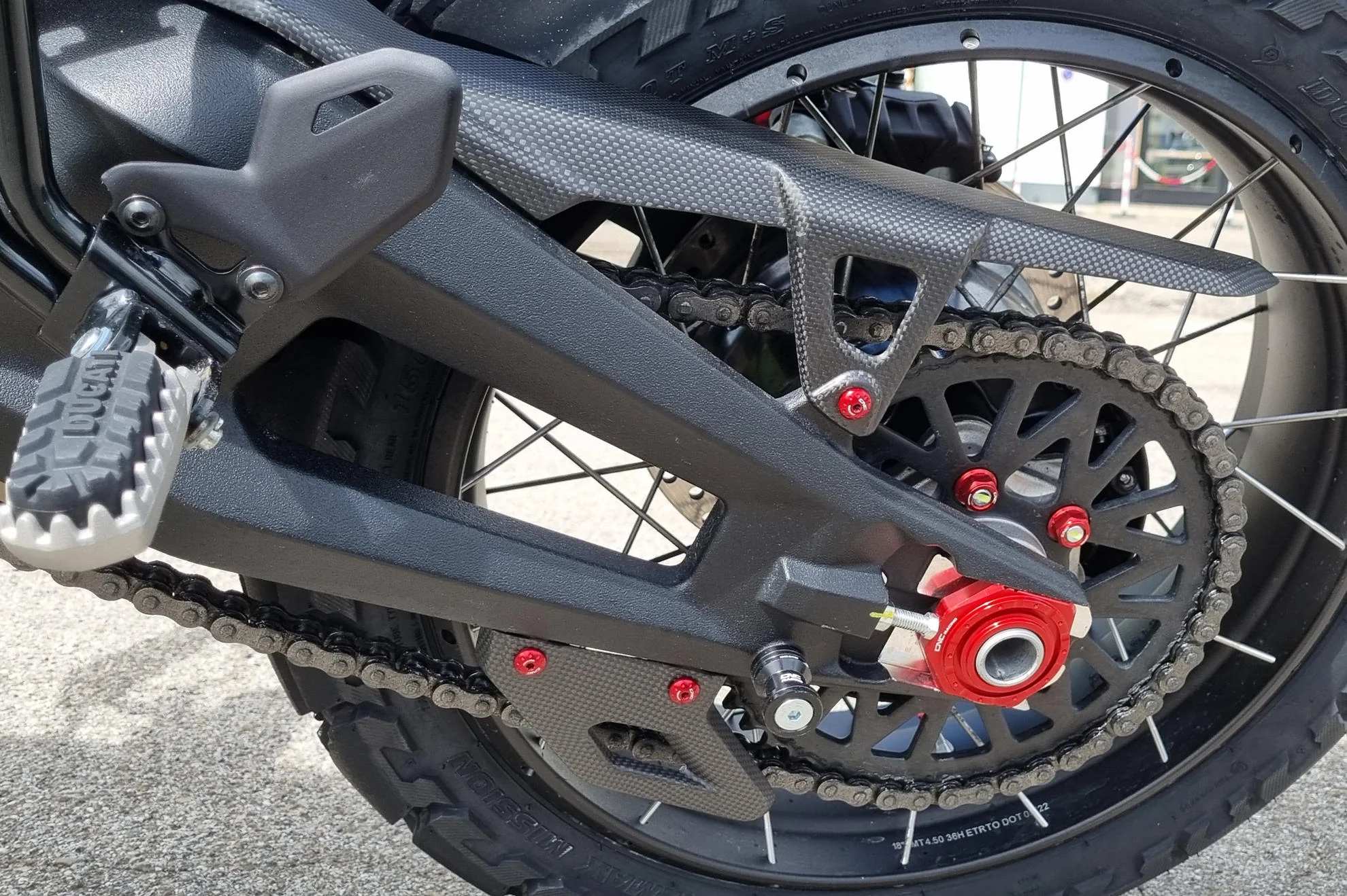 ZA244Y - CNC Racing Carbon Fiber Lower Chain Guard for the Ducati DesertX - Image 2